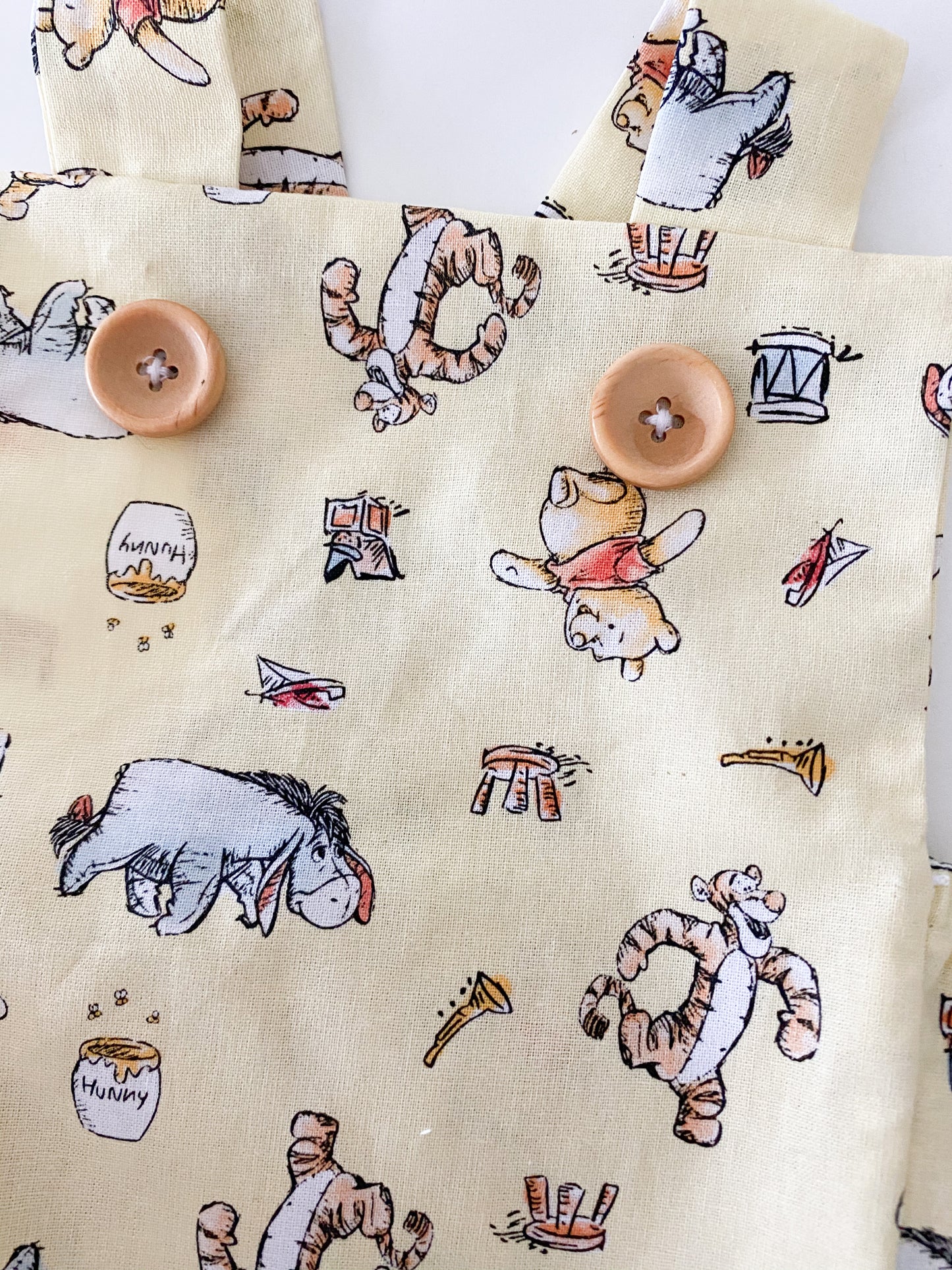 Winnie the Pooh yellow baby romper